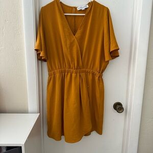 NWOT Emma & Michele Dark Mustard Wrap Romper. Size Large.